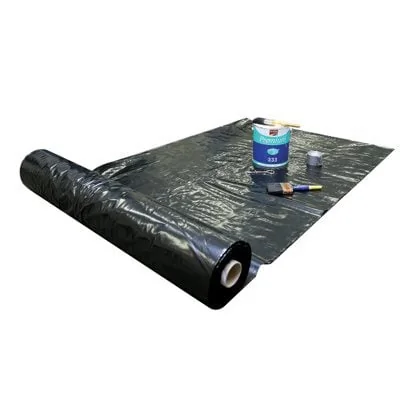 Roll of black builders film opened across a protected work surface